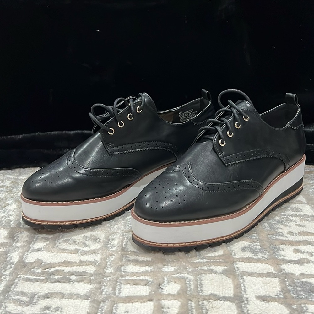 Black platform flat